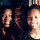 The author, her mom and sister celebrating Kwanzaa in 1995 (courtesy of Moji Alawode-El)